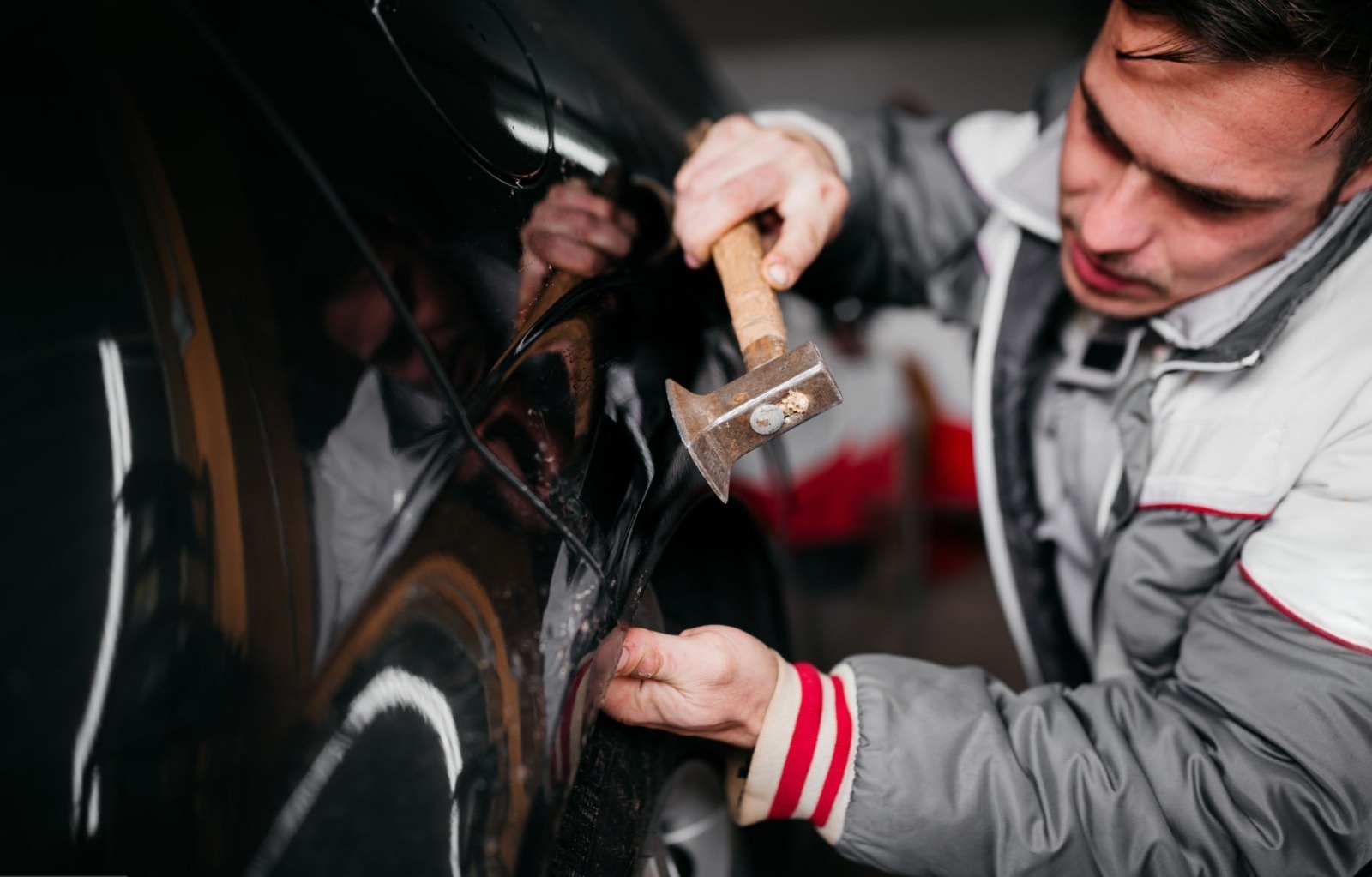 Technician performing a panel and structural repair
